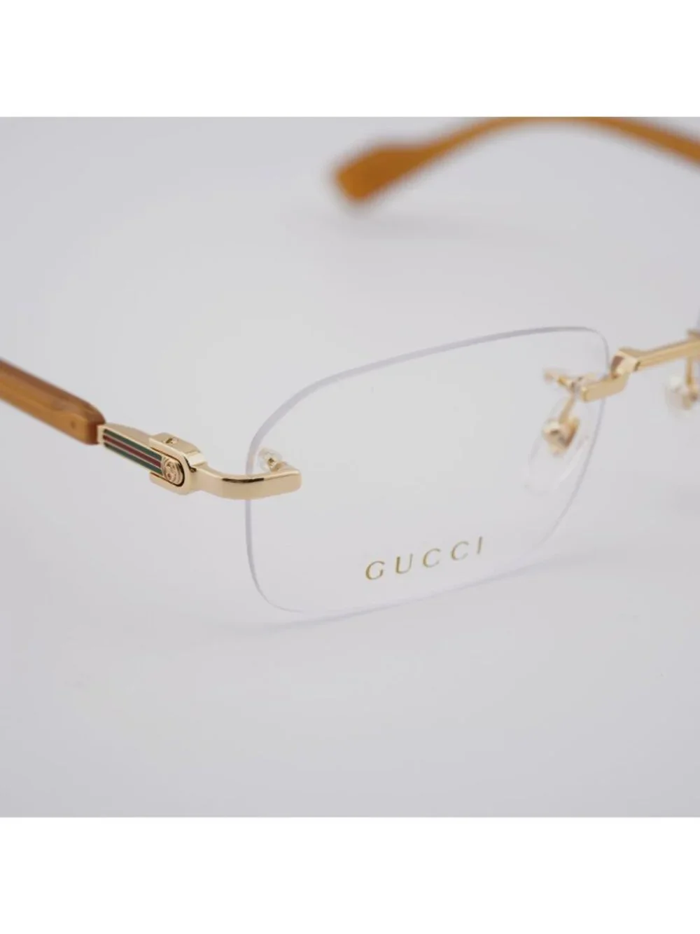Gucci GG1221O 006 Rimless Eyeglasses Gold 56mm Rectangle Frame